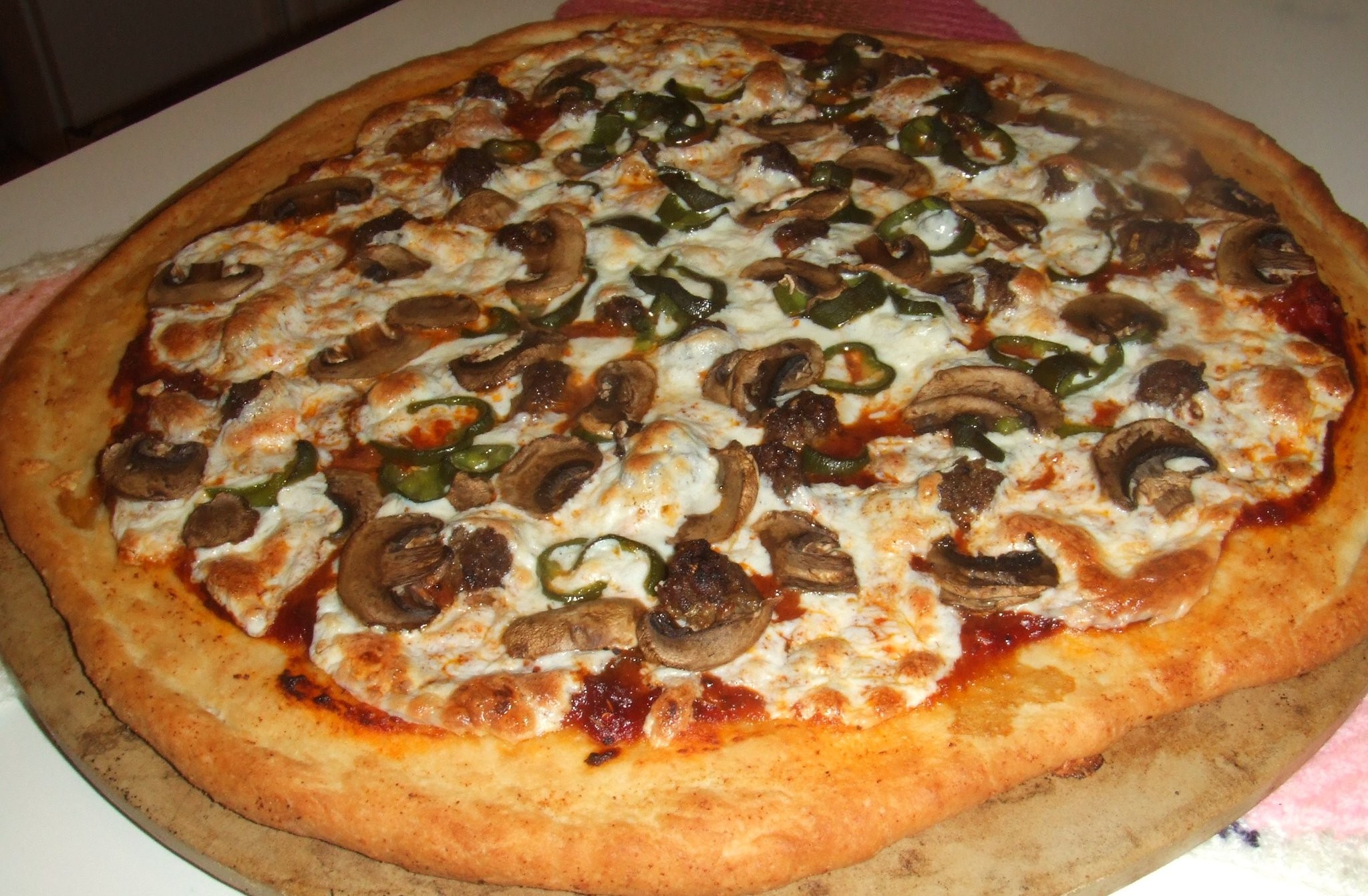 Pizza de Carne y Hongos